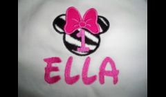 Girl's Minnie Mouse Birthday Onesie available for $10.00 plus $2.00 shipping.  Available in sizes 0-3T.  The name and number can be changed.  I can also change color schemes as well.  I do these in the clubhouse pink polka dots, red polka dots, light pink,