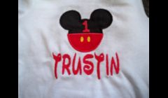 Boy's Mickey Mouse Birthday Onesie available for $10.00 plus $2.00 shipping.  Available in sizes 0-3T.  The name and number can be changed.  I can also change color schemes as well.  Or, you may want it without the number for a family trip to Disney.