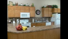 Our Kitchen and Dining Area. We have a large food preparation and serving area. We also use this area for crafts and other fun activities.