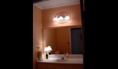 A stark dull half bath transformed into a soft comfortable Power Room. 