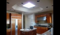 Skylight and opening designed to make kitchen space larger