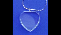 Crystal heart pendant engraved with YOUR picture inside-$16.95. Can ship anywhere in the U.S.\\n(We also offer dogtag, ovals, square, and circle pendant shapes.)