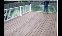 Large deck with Mahogany flooring and PVC railing