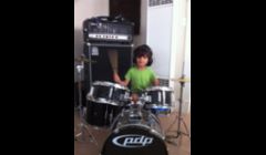 I also give drum lessons.   Junior and adult kits available to learn on.